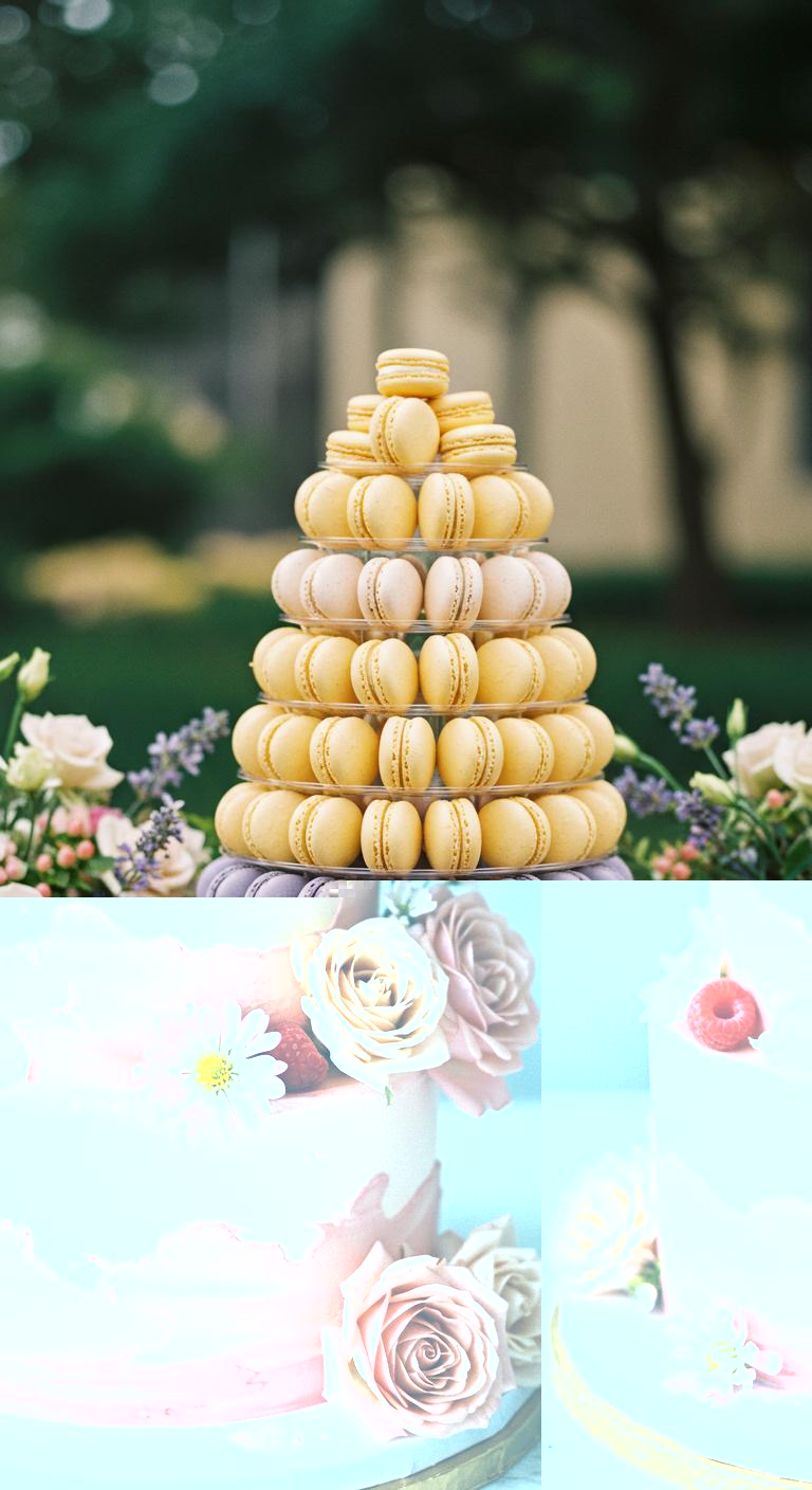 A **whimsical wedding cake** adorned with **pastel-colored macarons** in **vibrant flavors** such as raspberry and rose, surrounded by blooming flowers. The cake showcases an enchanting blend of nature’s beauty and artistic design, capturing the essence of spring with **fragrant blossoms** and delicate textures.