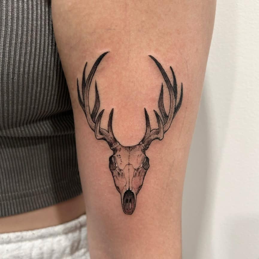 Minimal deer skull tattoo