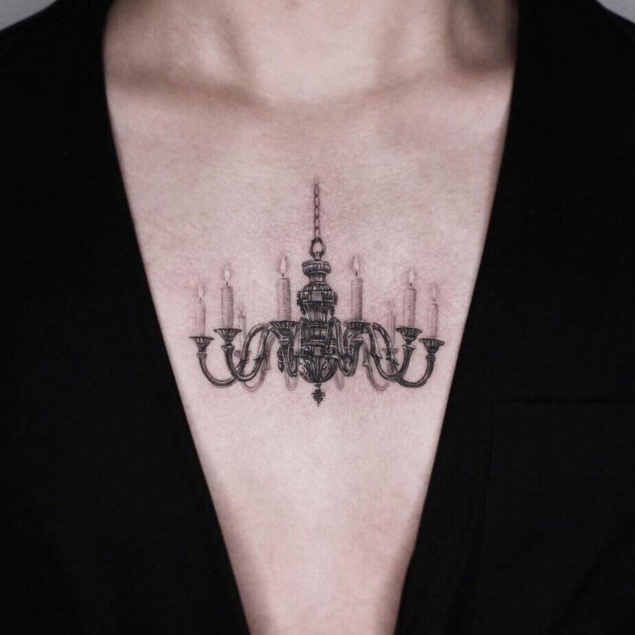 Bold gothic chandelier tattoo