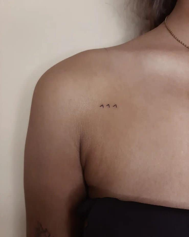 Delicate 111 collarbone tattoo