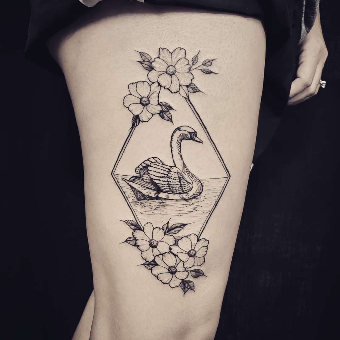 Floral frame swan tattoo