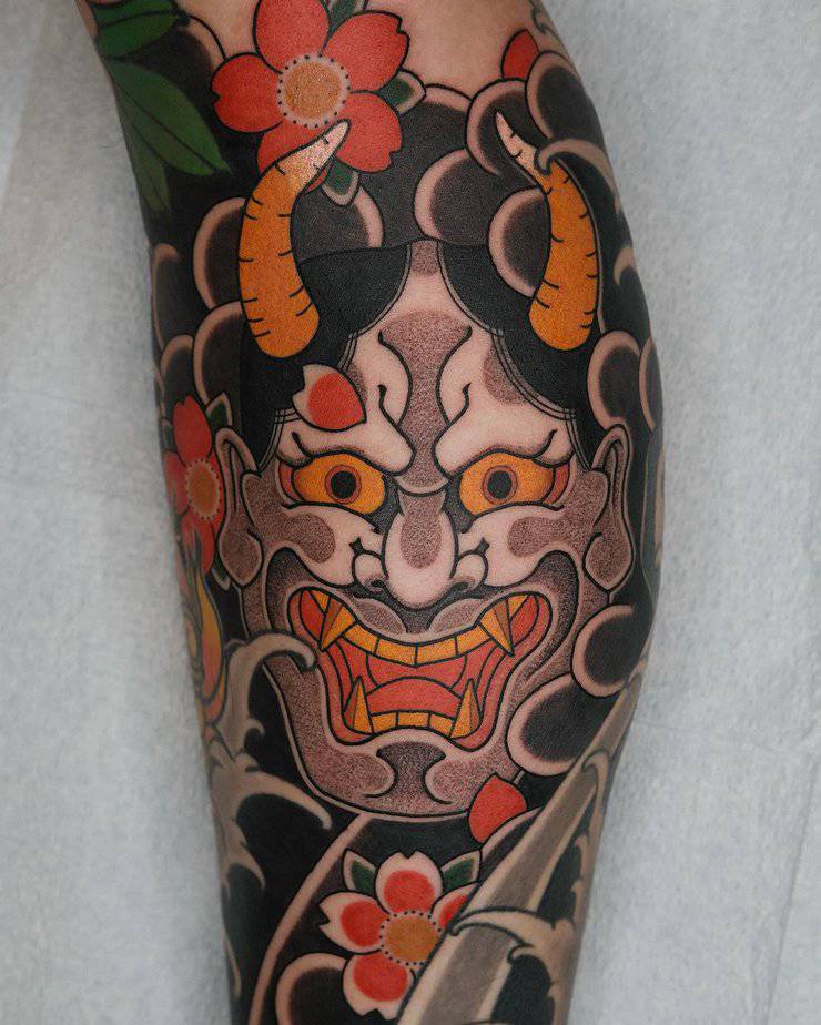 Hannya among blooming flowers with fiery orange eyes