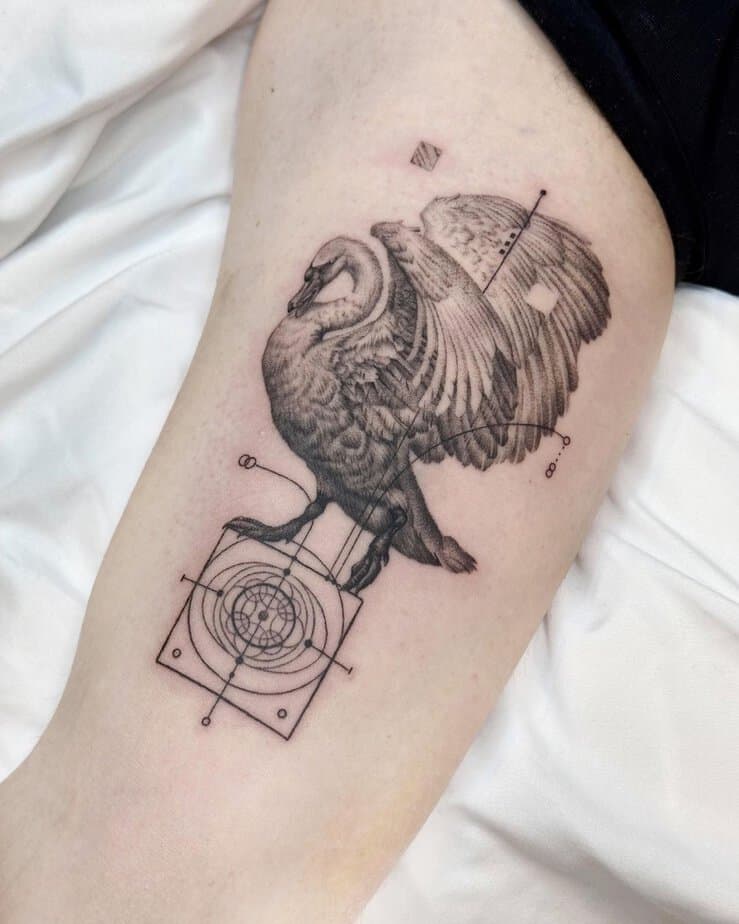 Geometric swan tattoo in a square composition
