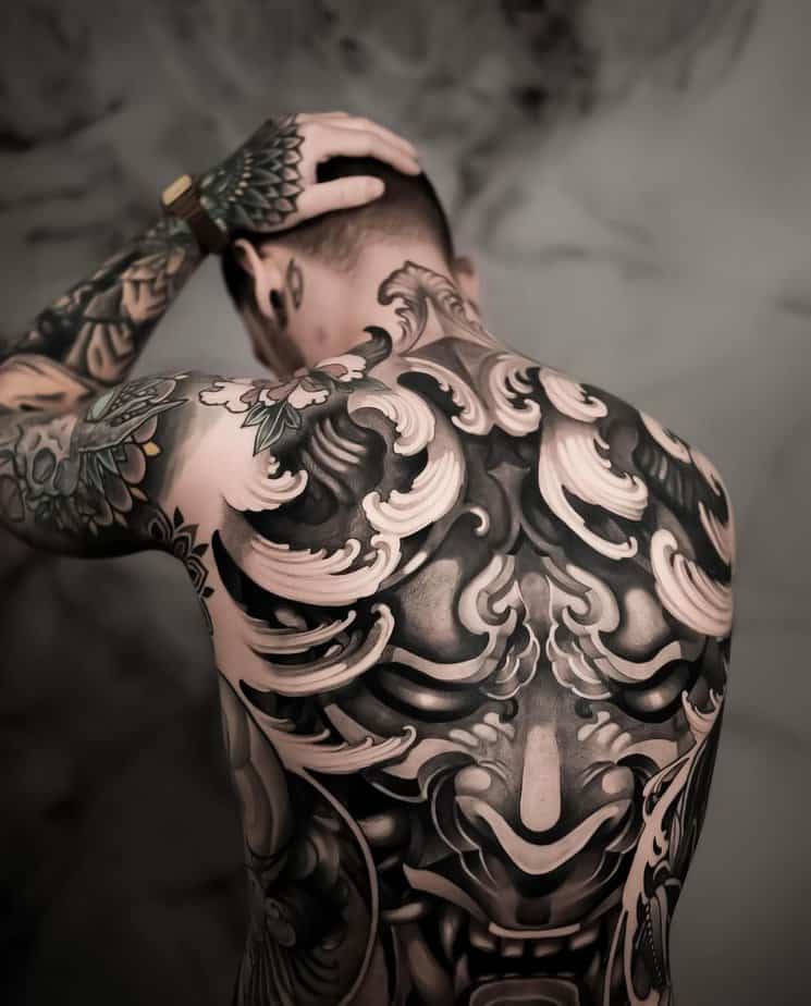 Full back Hannya tattoo in black and grey
