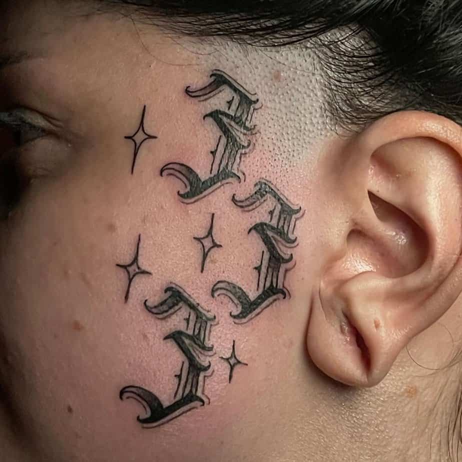 Facial ornament 333 tattoo