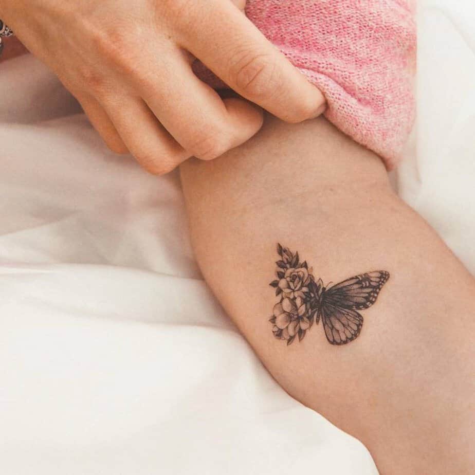 Butterfly tattoo with floral wing details