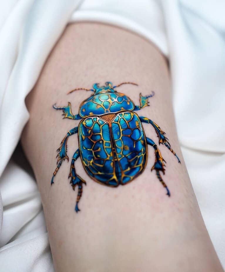 Vibrant blue beetle with gold accents for a jewel-like look