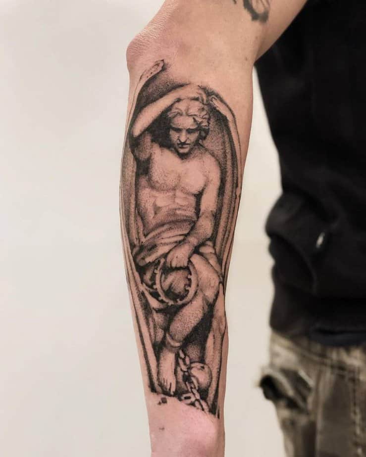 Statue-inspired tattoo with detailed shading