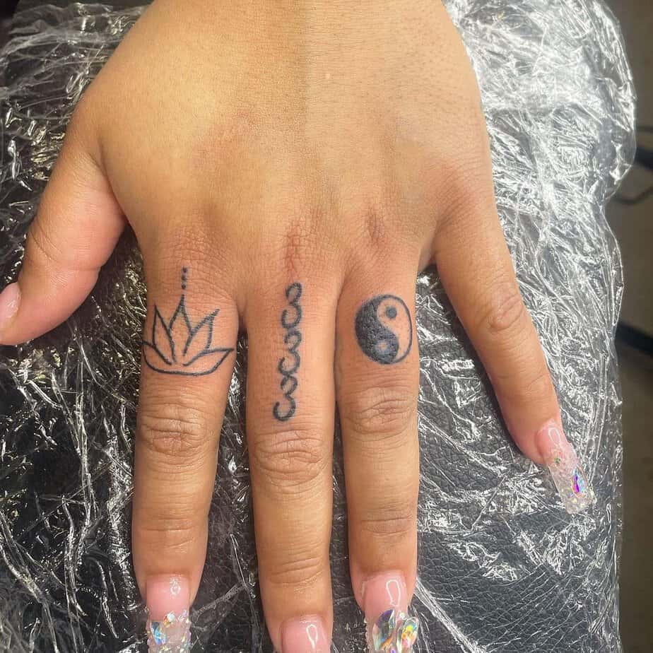 Middle finger 333 tattoo