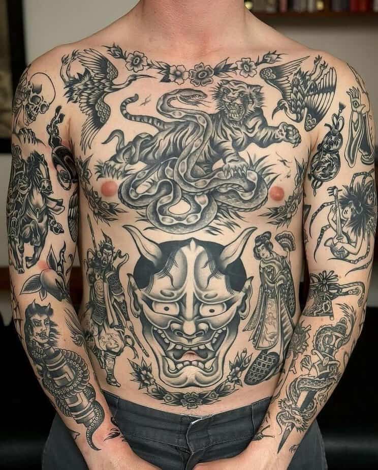 Black and grey chest piece centering a Hannya mask