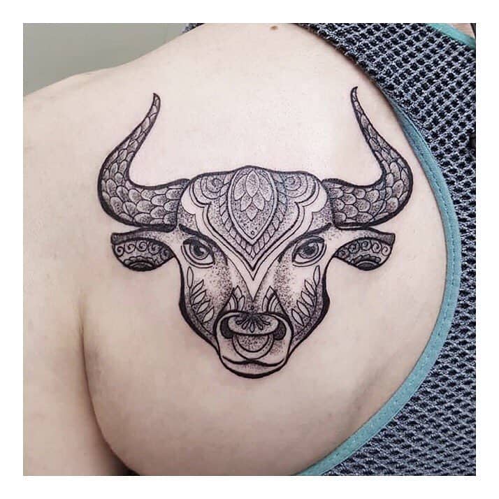 Ornate bull on the shoulder