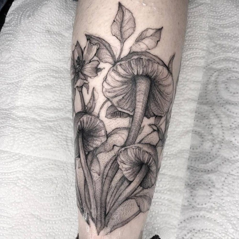 Monochrome mushroom tattoo with fine shading