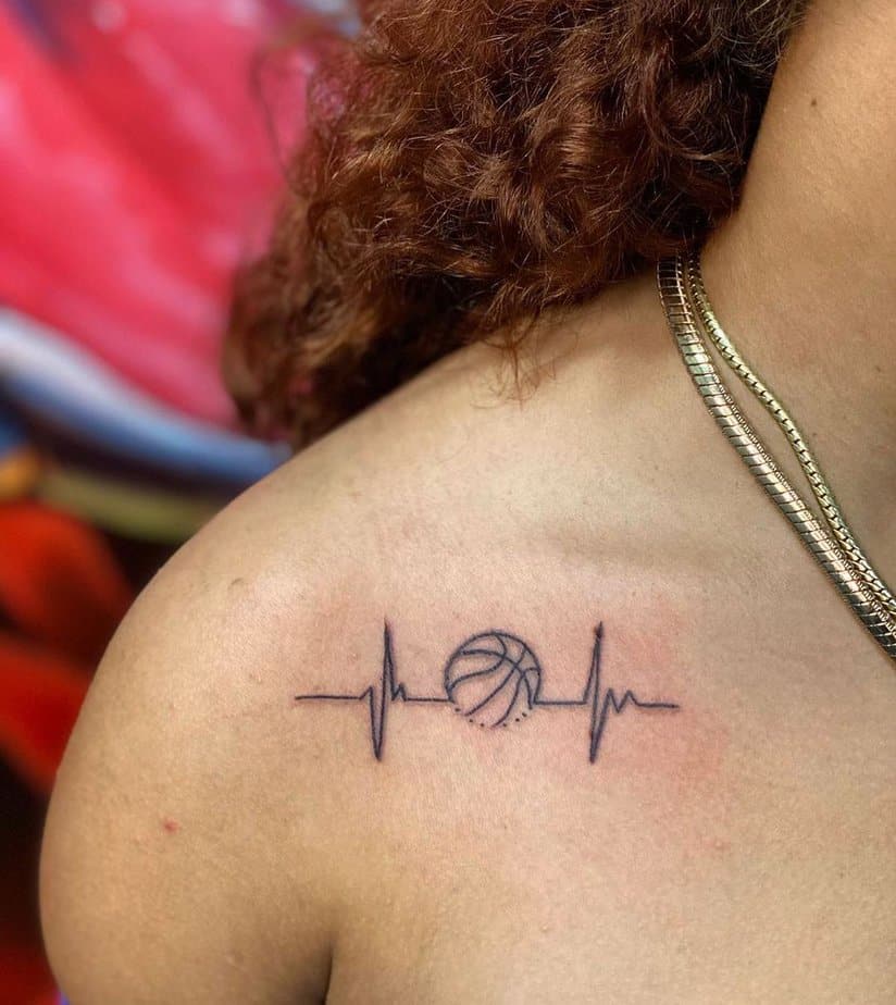 Minimalist basketball heartbeat tattoo