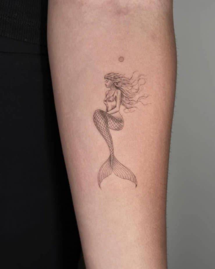 Soft and graceful siren tattoo