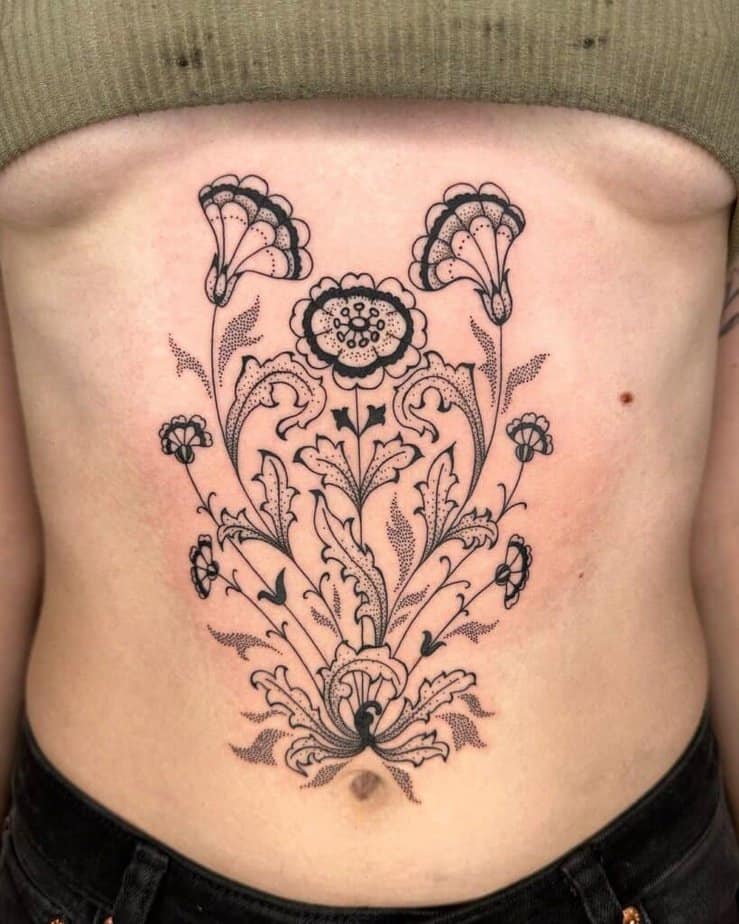 Floral dotwork stomach tattoo