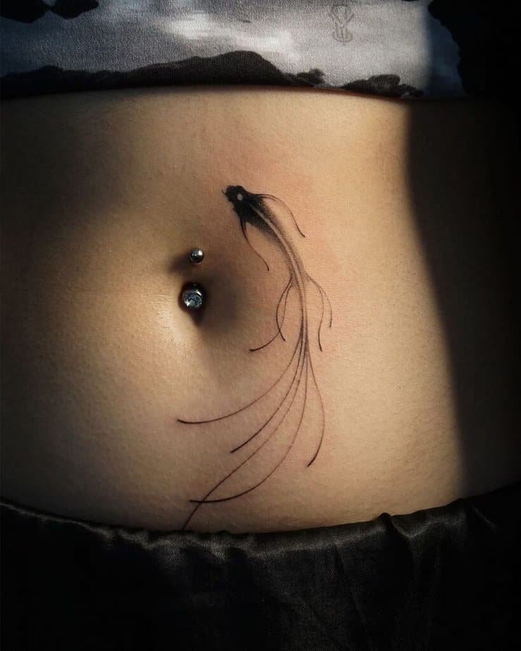 Delicate fish stomach tattoo