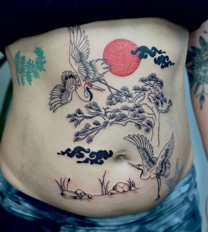 Japanese-themed stomach tattoo