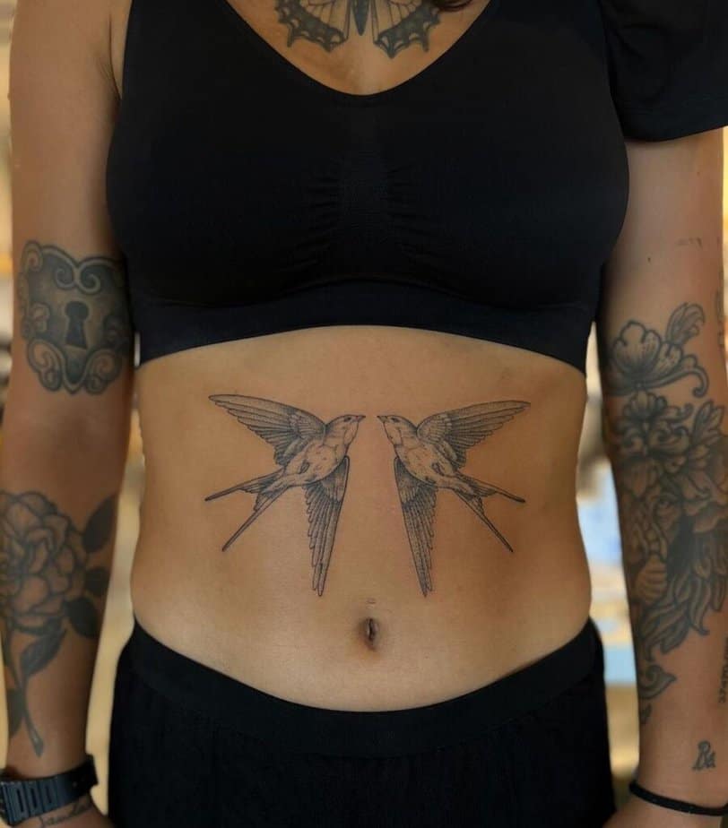 Swallows stomach tattoo
