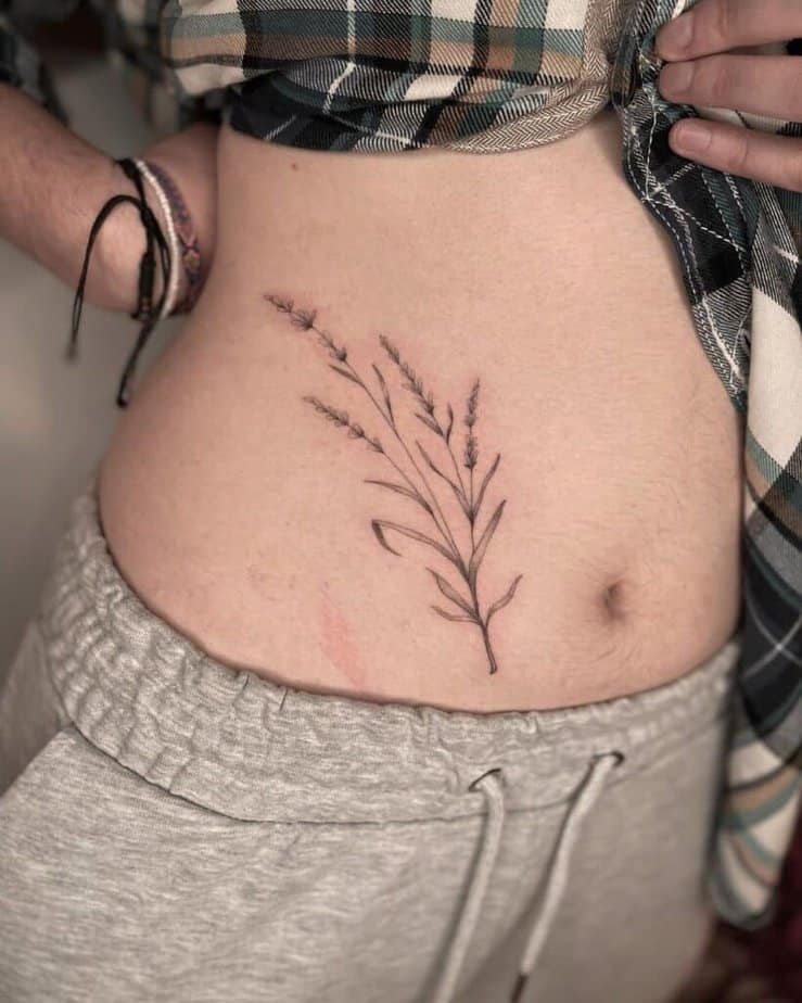 Lavender stomach tattoo