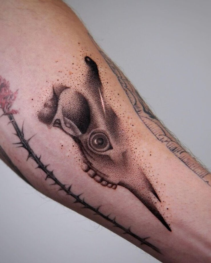 15. Giraffe skull by a flower