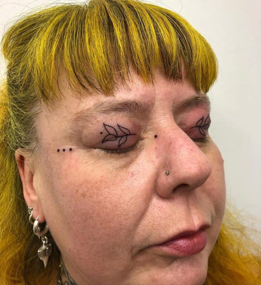 15. A botanical eyelid tattoo