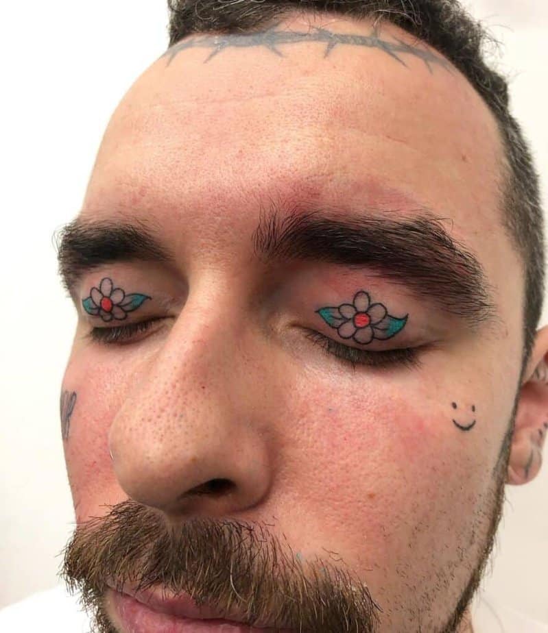 18. A tattoo of two flowers