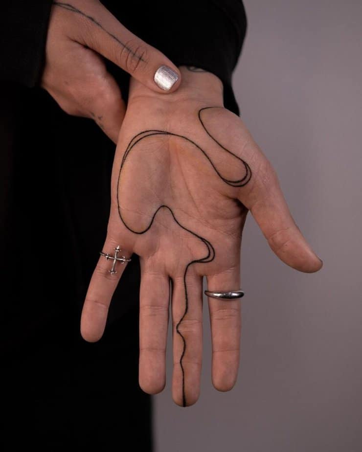 Organic fine-line tattoo