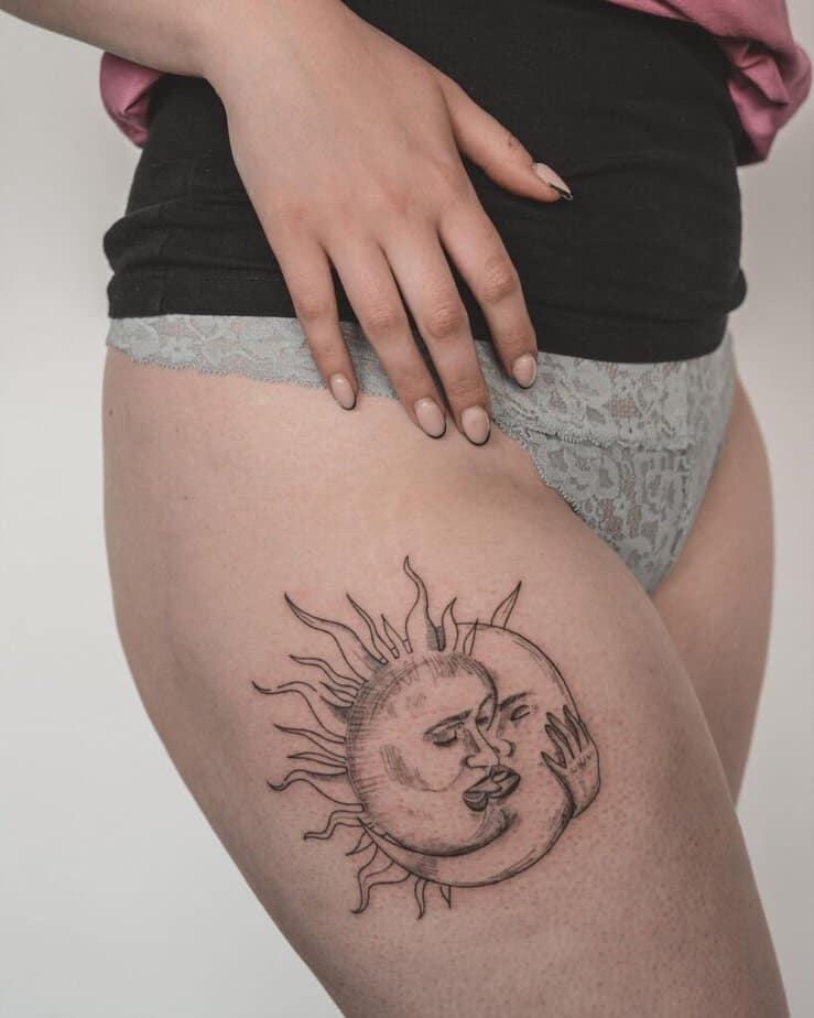 Sun and moon kiss tattoo