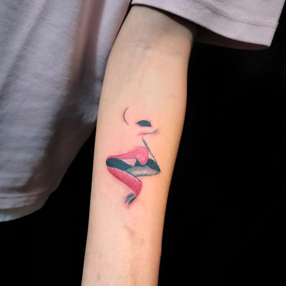 Red and black lips tattoo