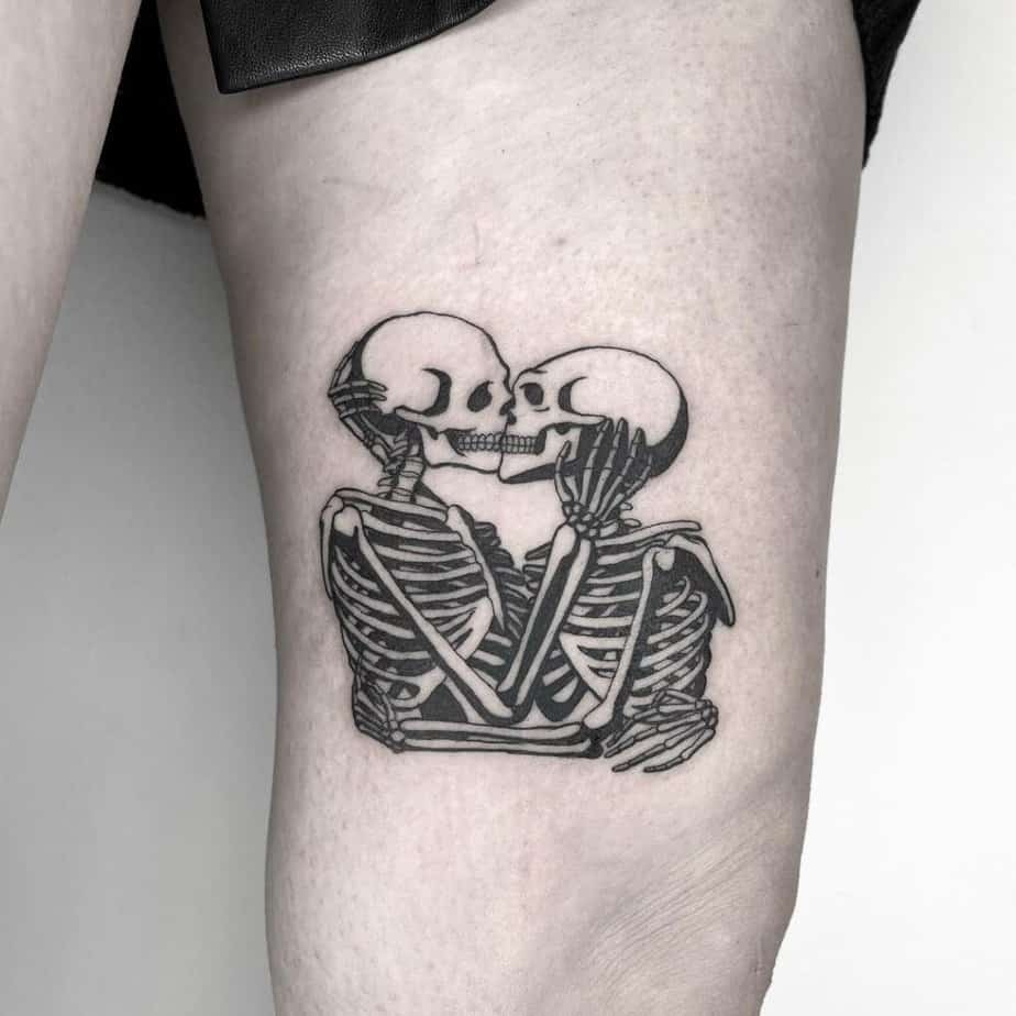Skeleton kiss tattoo