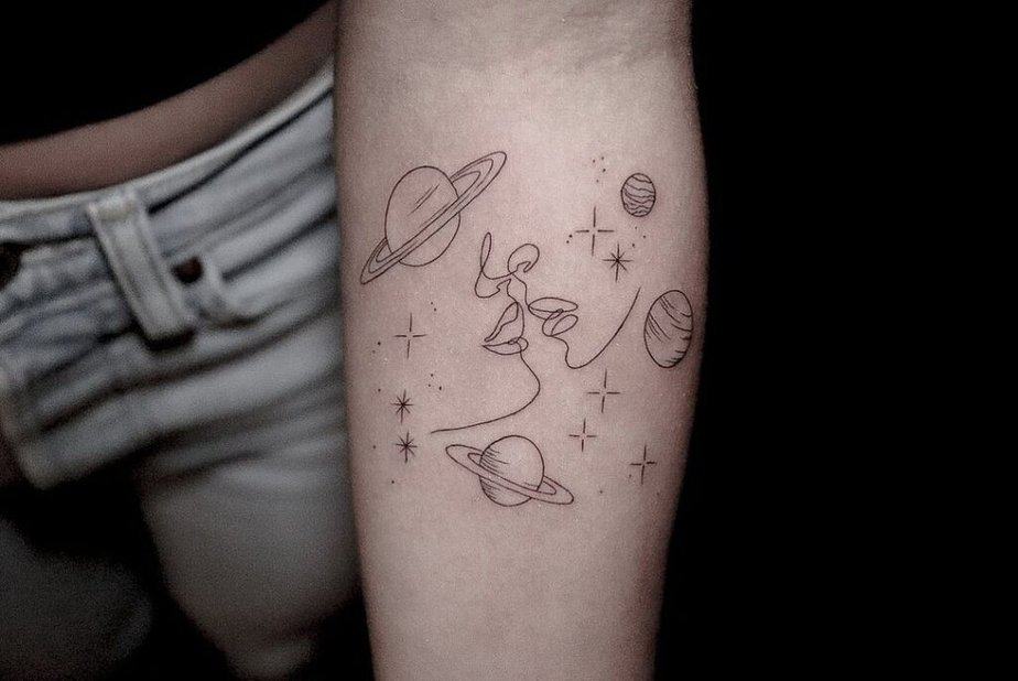 Fine-line kiss tattoo