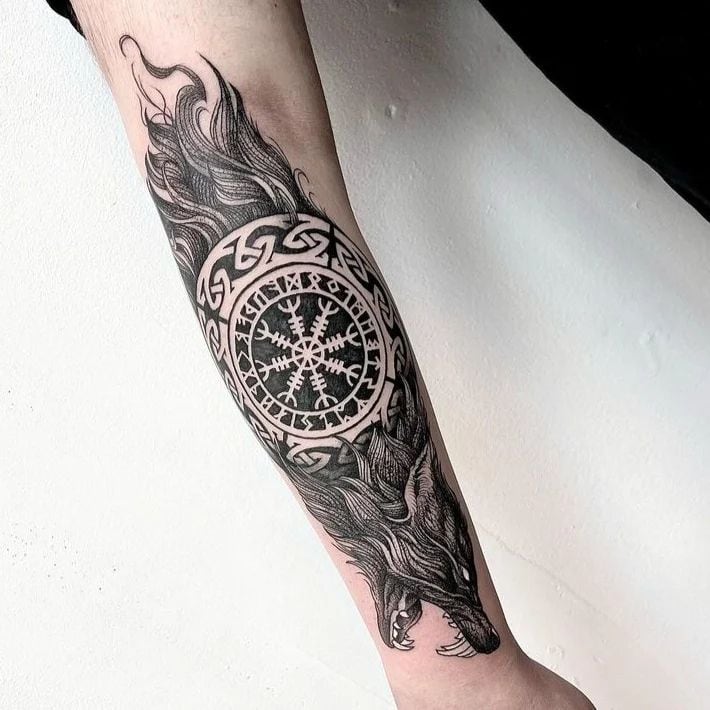 5. Majestic Nordic wolf design with runes