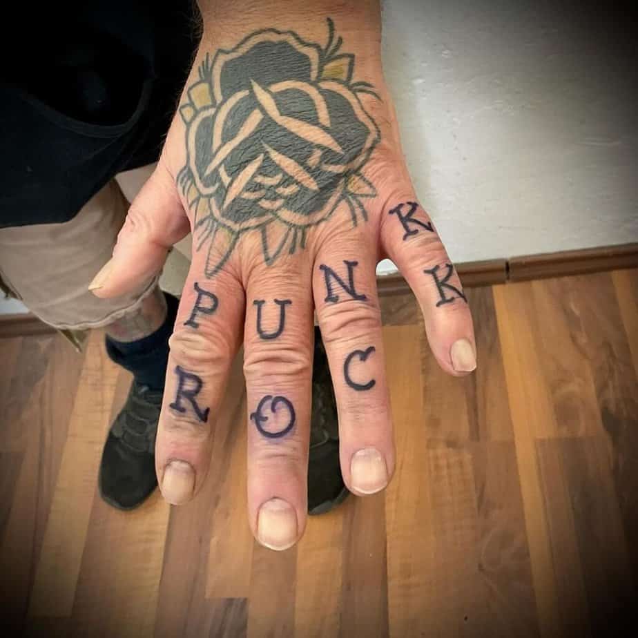 9. Knuckle tattoo for music lovers