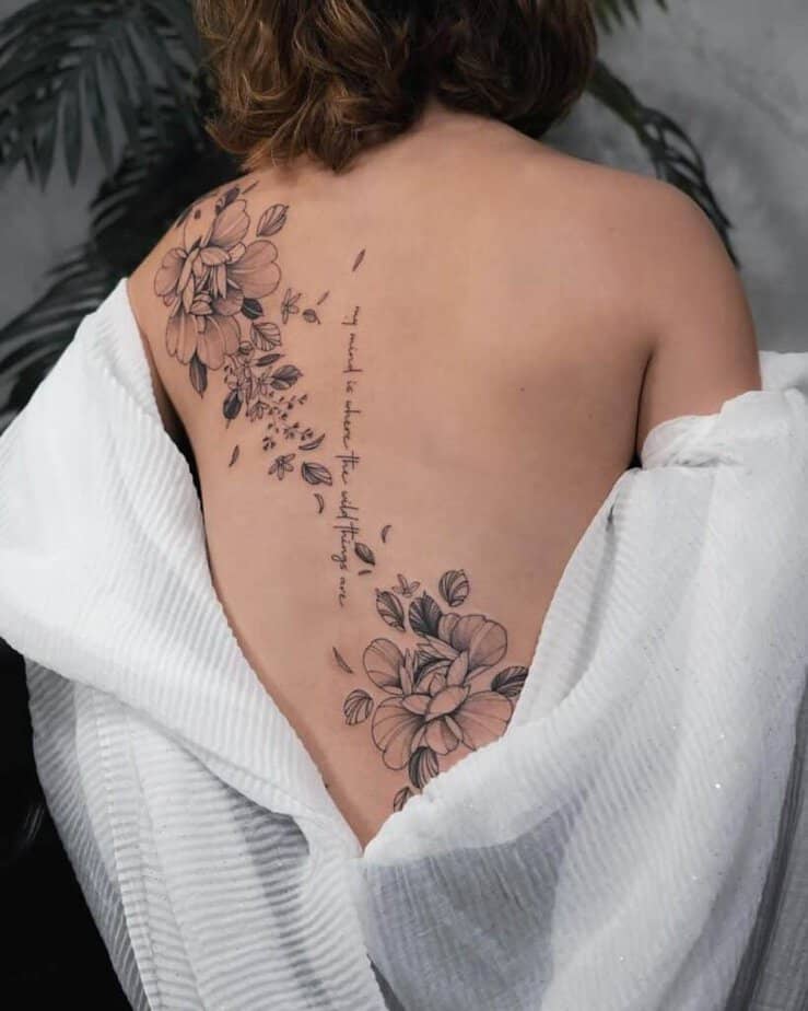 17. Matching floral tattoos with sayings