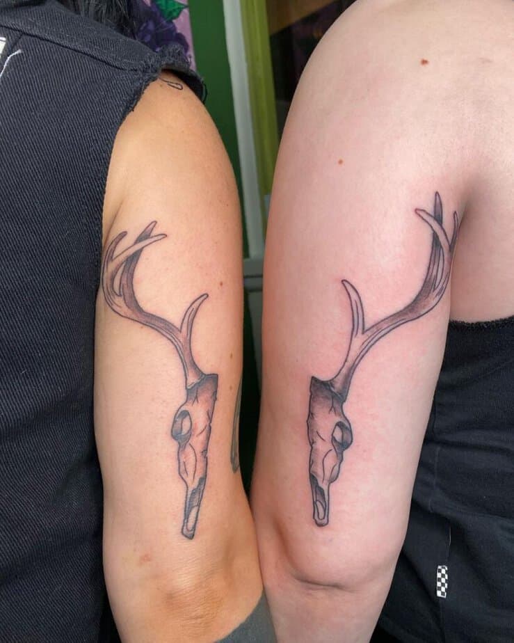 17. A matching deer skull tattoo