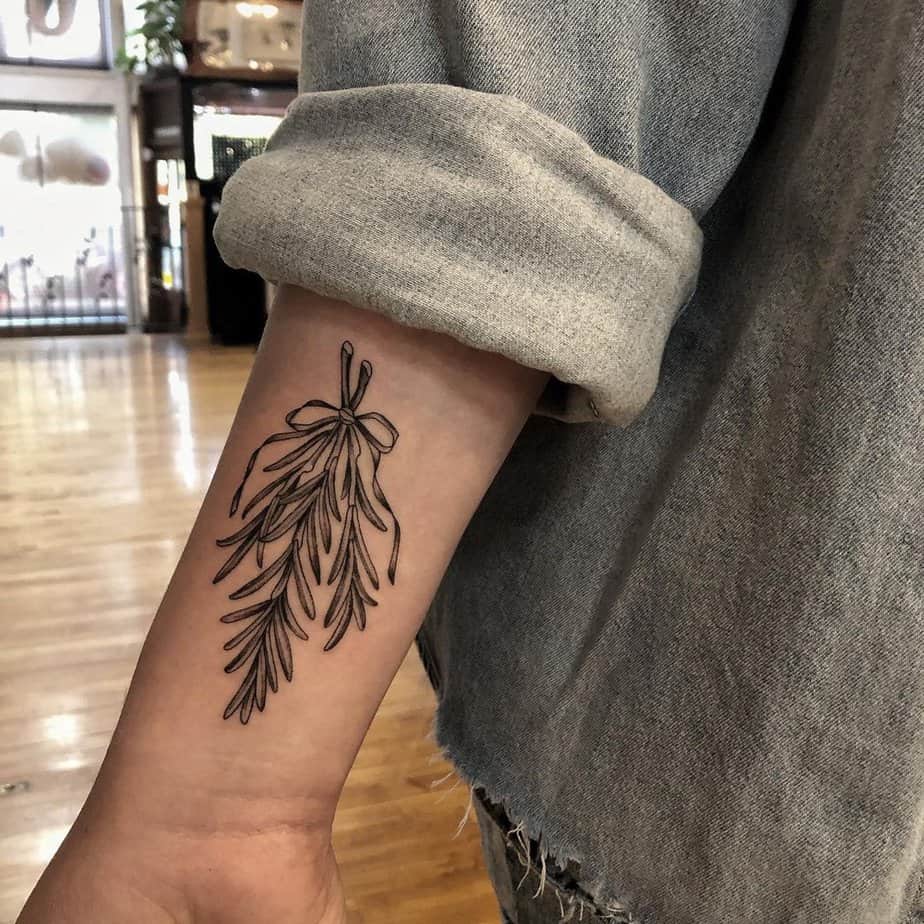 Black and gray tattoo on the forearm