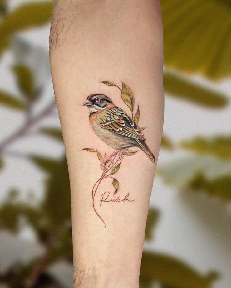 13. A tattoo of a sparrow with a name