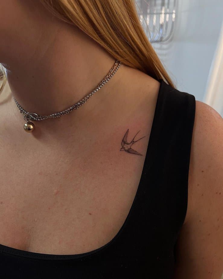 6. A tiny sparrow tattoo on the collarbone