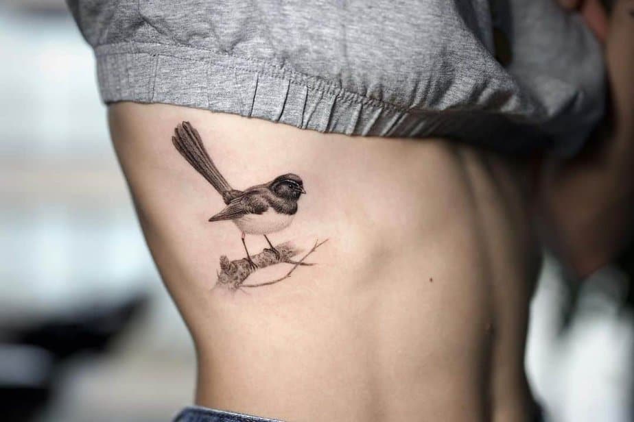 7. A sparrow tattoo on the ribcage