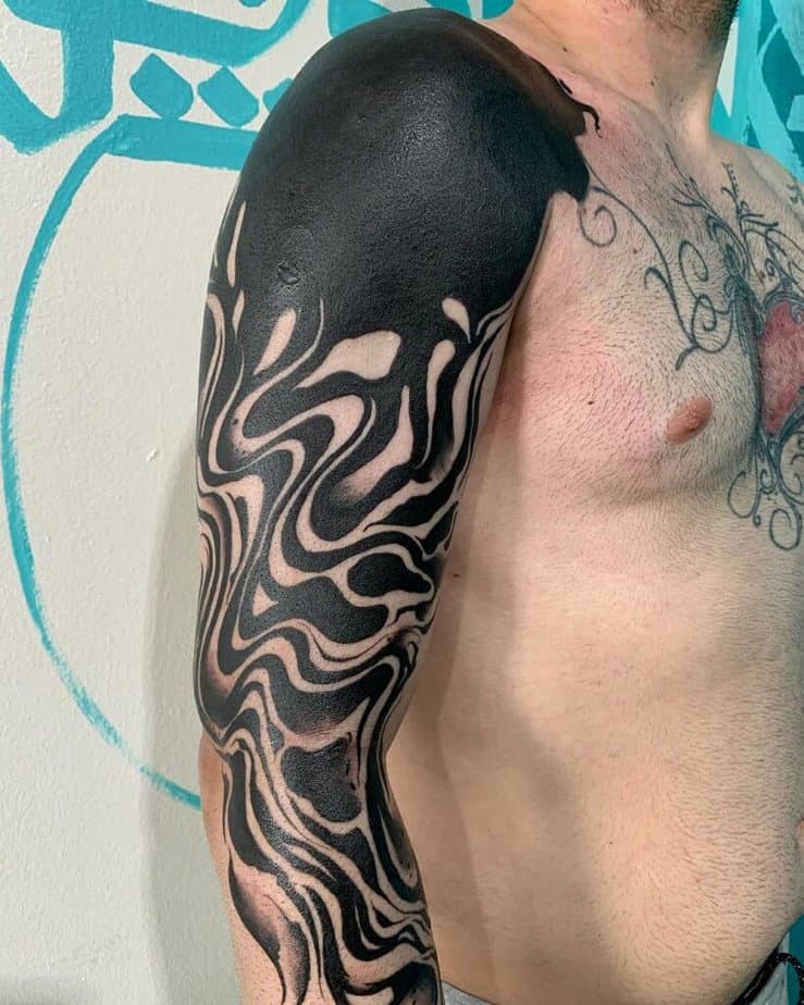 8. Abstract blackout tattoo