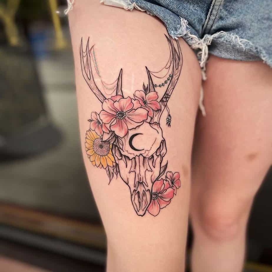 Blooming deer skull tattoo
