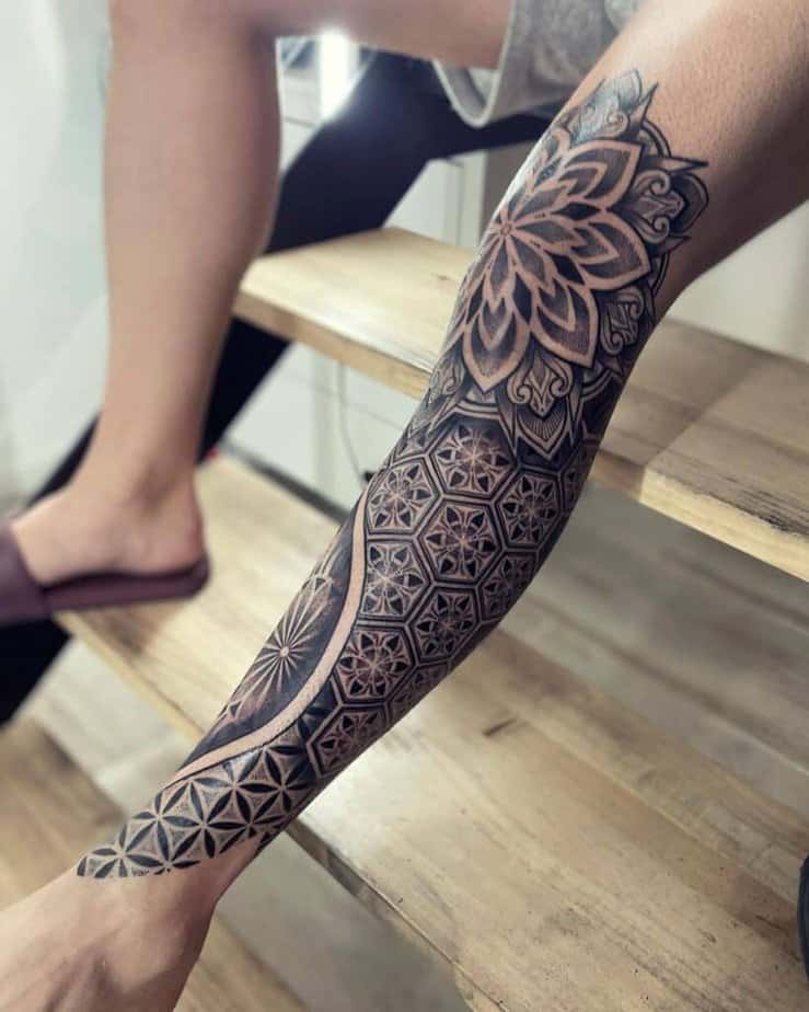 7. A dotwork leg sleeve tattoo