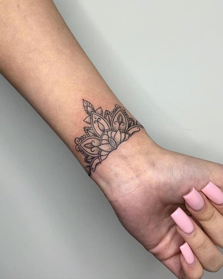14. A dotwork wrist tattoo