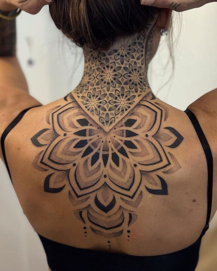 20. A dotwork back tattoo