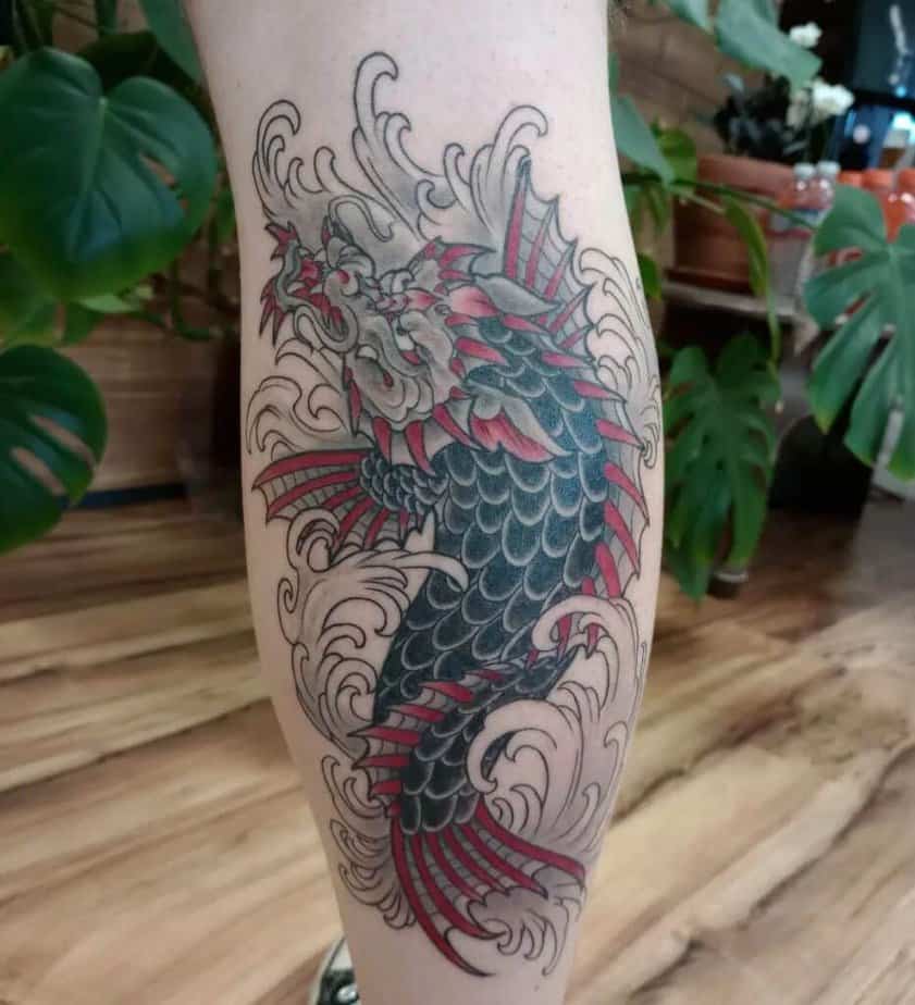 Black and gray dragon koi tattoo
