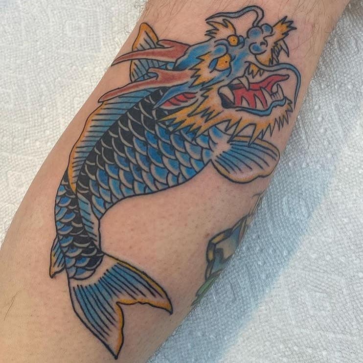 Blue dragon koi tattoo