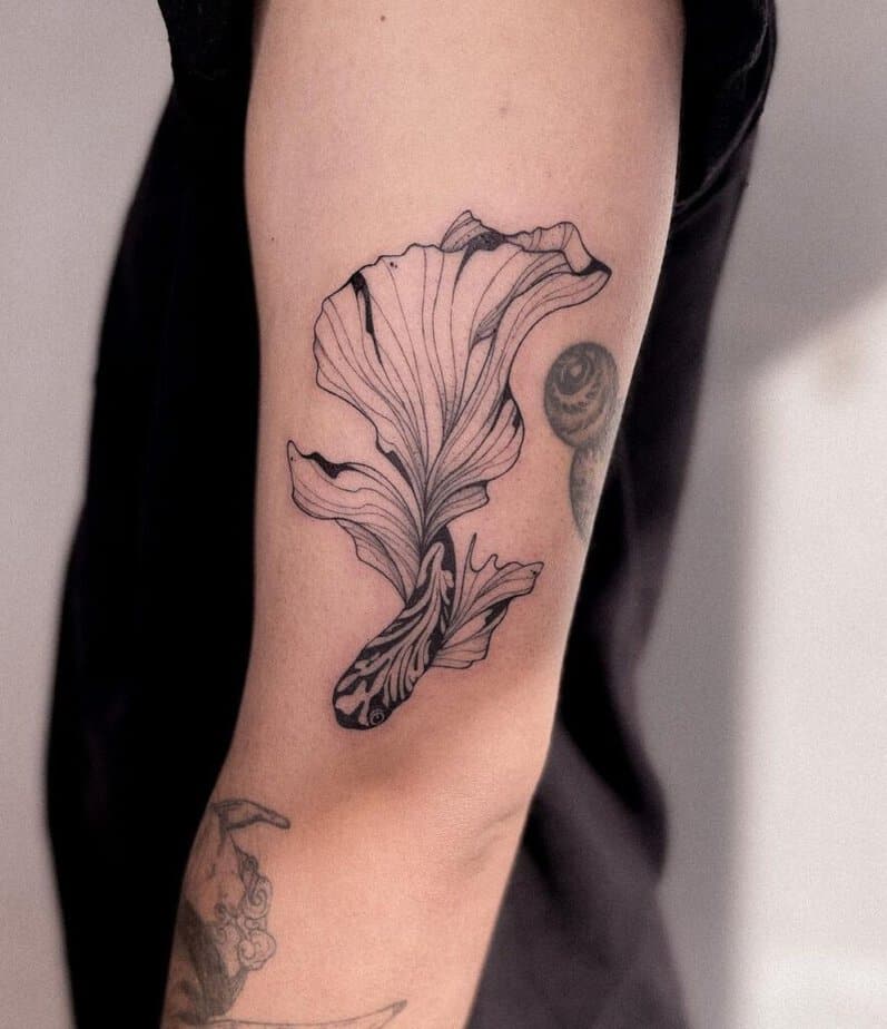 5. An abstract koi fish tattoo