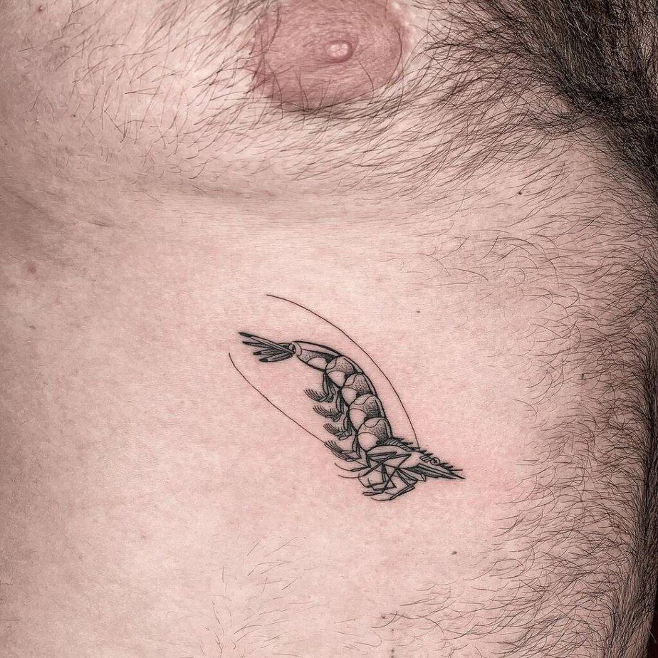 16. A small shrimp tattoo on the chest