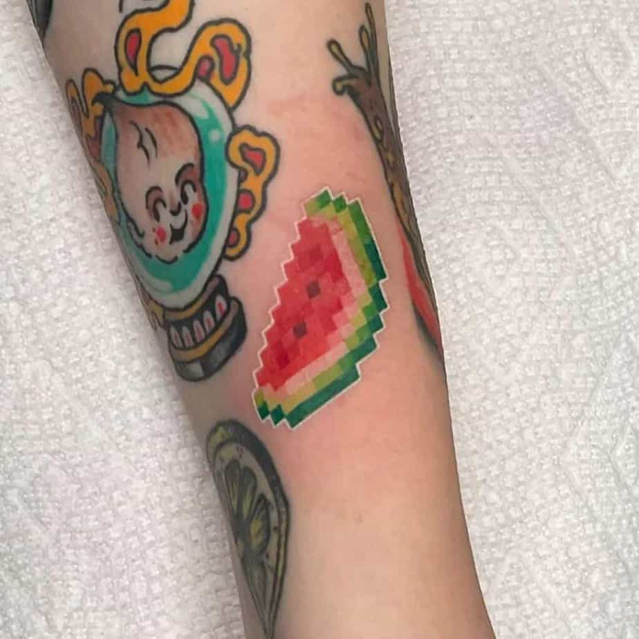 Minecraft watermelon tattoo on arm