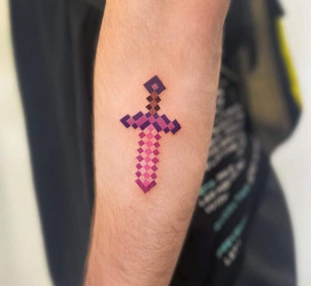 Pink Minecraft sword tattoo